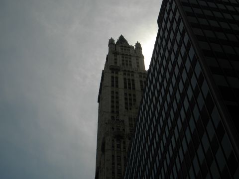 1992 Ford Bronco - A view of two distinct architectural styles of skyscrapers reaching towards the sky.