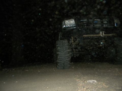 1992 Ford Bronco - This 1992 Ford Bronco is shown at night with large off-road tires and a front winch.