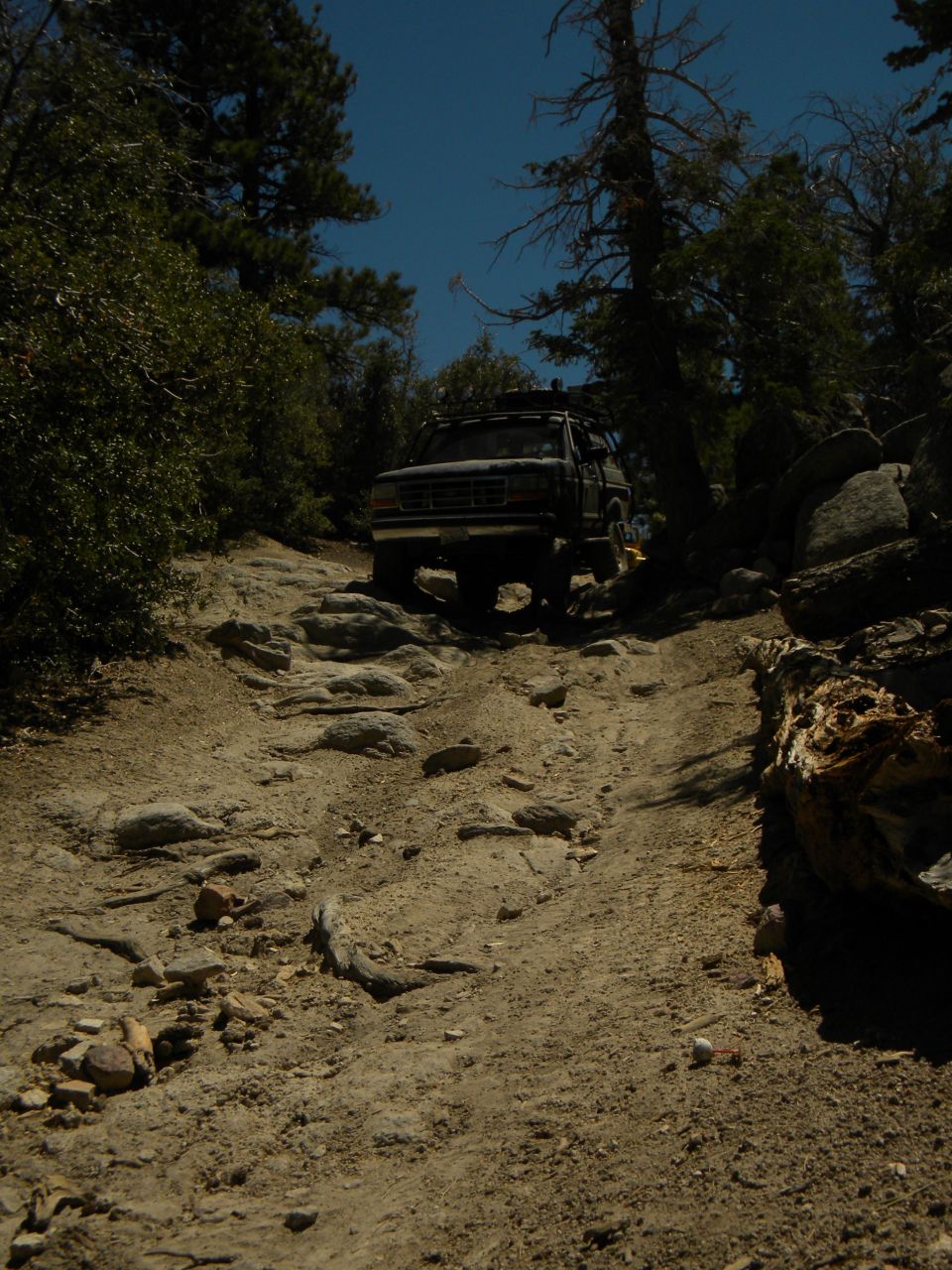 1992 Ford Bronco on a rocky mountain trail