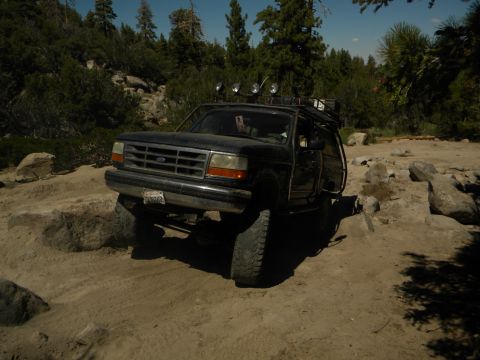 1992 Ford Bronco - This 1992 Ford Bronco navigates a rocky trail with its front end angled towards the camera.