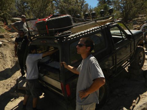 1992 Ford Bronco - Off-roading in a 1992 Ford Bronco, preparing for the trail with extra gear.