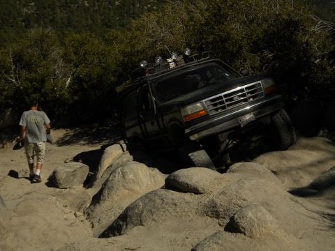 1992 Ford Bronco - This 1992 Ford Bronco is tackling a challenging off-road course.