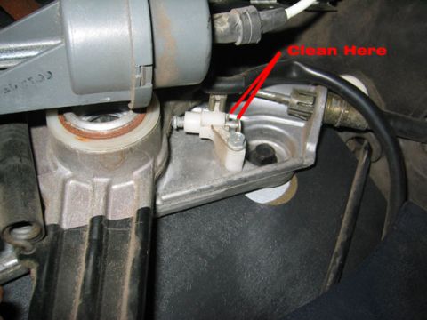 1996 Ford Crown Victoria - Close-up of an interior mechanical component with instructional text and arrows.