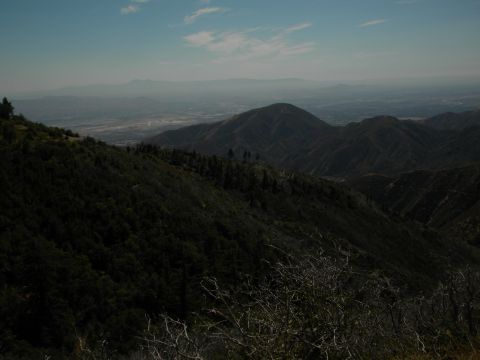 Mountain landscape with valley and distant haze