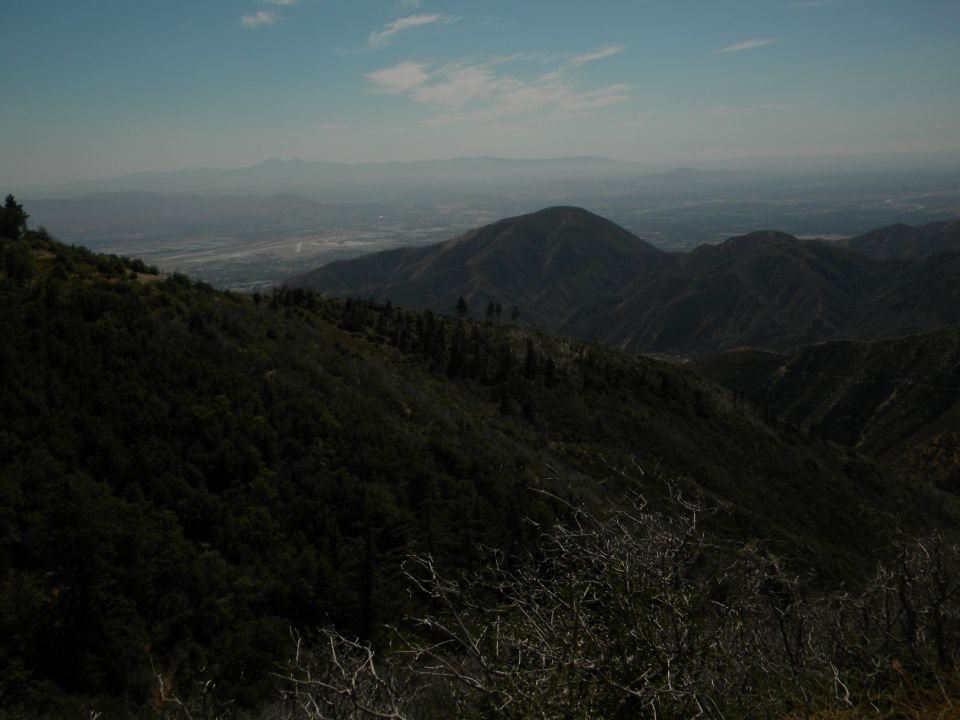 Mountain landscape with valley and distant haze