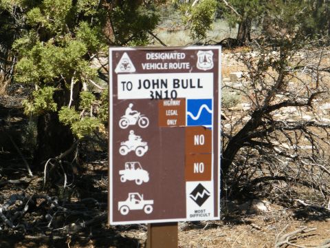 1982 Ford Bronco - Signpost indicates a designated vehicle route to John Bull 3N10, showing allowed and disallowed vehicle types.