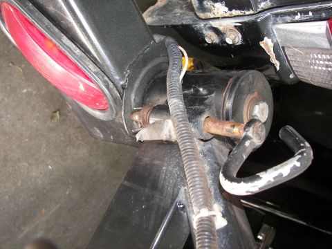 1988 Ford Bronco - Rear bumper tow hook and taillight assembly detail.