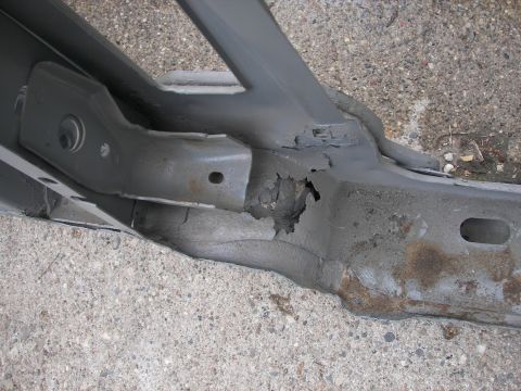 1988 Ford Bronco - This vehicle frame section shows significant rust and corrosion damage.