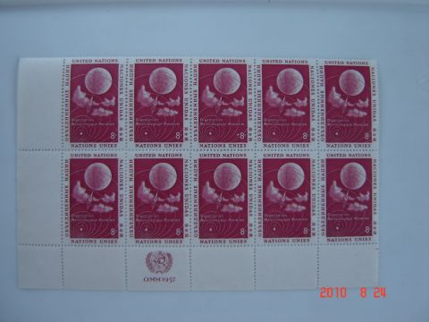 1993 Ford Bronco - A sheet of 10 United Nations stamps, each depicting a globe and clouds, with the year 1957 visible on one stamp.