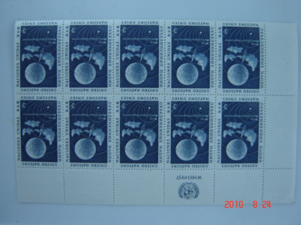 Sheet of United Nations stamps showing a globe and clouds