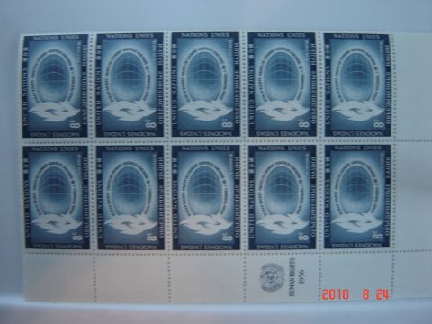 1993 Ford Bronco - Sheet of United Nations stamps a globe and doves, with text indicating 'Human Rights 1996'.