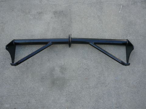 1988 Ford Bronco - A black metal bar with angled supports is shown against a concrete background.