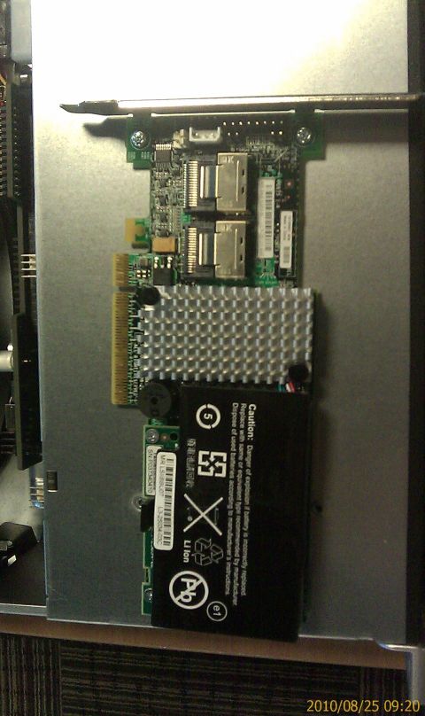 1985 Ford F-150 - A close-up view of a circuit board assembly a battery pack and heatsink, likely part of a computer system.
