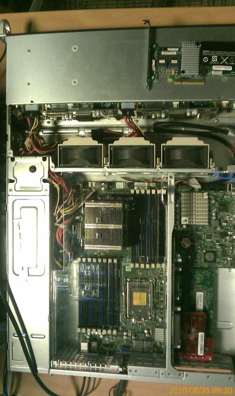 1985 Ford F-150 - Computer server internals showing motherboard, RAM slots, heatsinks, and cooling fans.