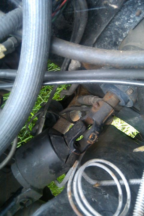 1988 Ford Bronco - Steering column universal joint assembly, likely from an older vehicle's engine bay.