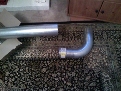 1990 Ford Bronco - This is an exhaust pipe bend, likely for a custom build or repair. Part number 472 is visible on the label.