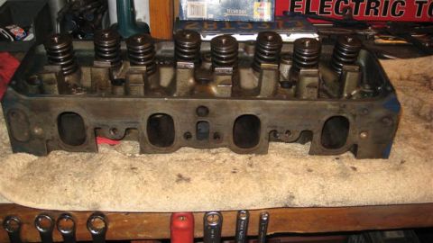 1968 Ford Ranchero - A close-up view of an engine cylinder head, showing the valve train components.