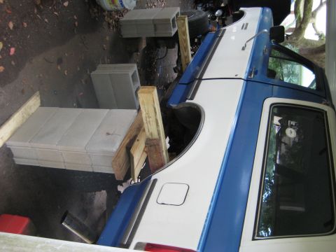 1988 Ford Bronco - This 1988 Ford Bronco is supported by blocks and wood for rear axle work.
