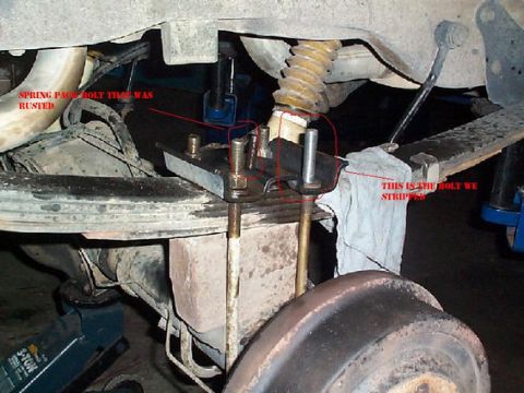 1992 Ford Bronco - This is the rear 4 inch lift block before the ubolts were off, this turned out to be a real pain, the u bolts use nylon locking nuts and ne…