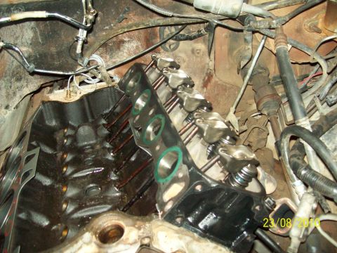 1985 Ford Bronco - Close-up view of an engine's internal components during a repair or rebuild process.