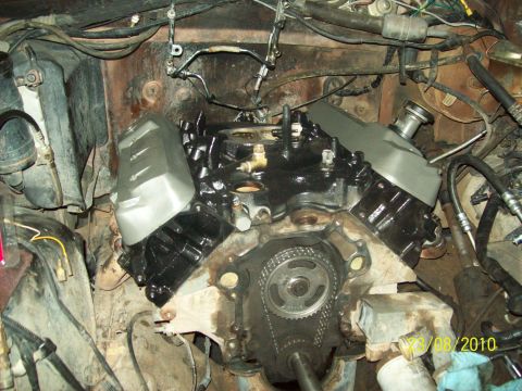 1985 Ford Bronco - Engine bay details with the timing cover removed, showing internal components.