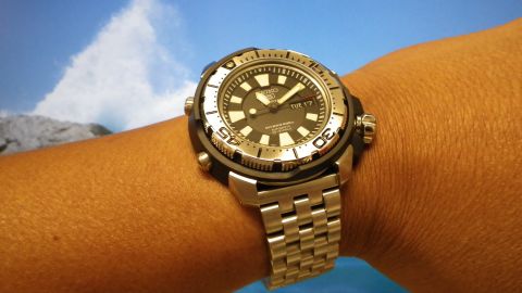 1996 Ford Bronco - Seiko automatic watch with day and date complication shown on a wrist.