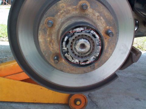 1992 Ford Bronco - Attempting to remove the hub assembly..I had a real tough time getting the locking ring out, but finally did with a small screwdriver. Afte…