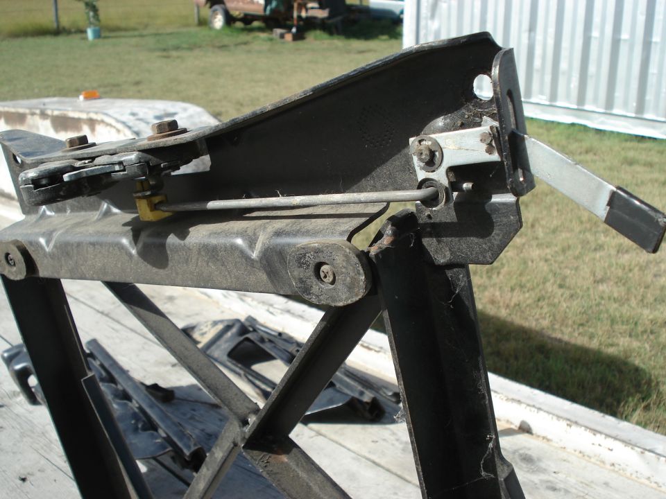 Seat adjustment mechanism with lever and rod