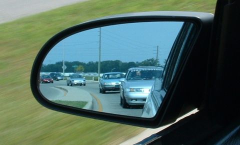 1993 Ford Taurus - View of traffic on the highway from the side mirror.