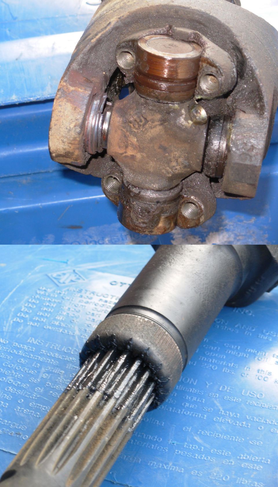 Turns out the rattle wasn't JUST from the rear diff.  The front joint in the rear driveshaft is SEVERELY worn, and missing all its needle bearings, and the slip joint is pretty loose.