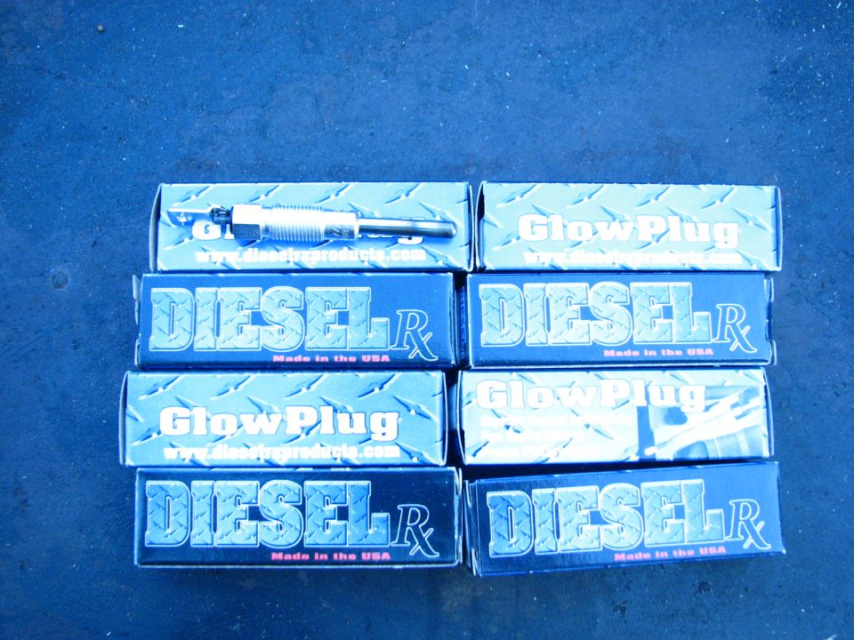 Several boxes of Diesel R glow plugs and some loose glow plugs