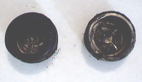 1989 Ford Bronco - Here is a top view of the u-joint caps. The one of the left became oblong. NOTE: ALL bearings are gone.