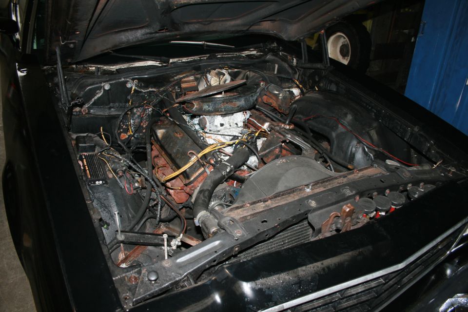 1973 Ford Ranchero engine bay with V8 engine, fan, and wiring