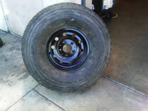 1986 Ford Bronco - A close-up view of a single tire and wheel assembly, likely for a truck or SUV.