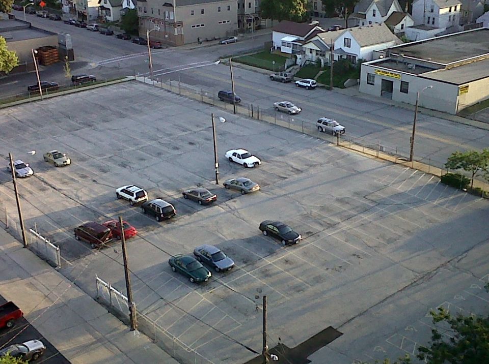 White 2003 Ford Crown Victoria parked in a lot