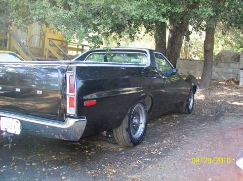 1972 Ford Ranchero - This 1972 Ford Ranchero is seen from the rear in an outdoor setting.