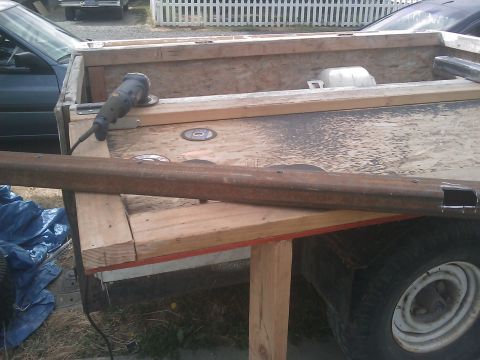 1996 Ford Bronco - Pass side with nuts welded in and a rough cut for seatbelt bolts