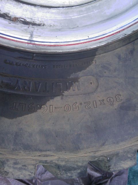 1996 Ford Bronco - Close-up of a tire sidewall displaying size and "MILITARY-" text.