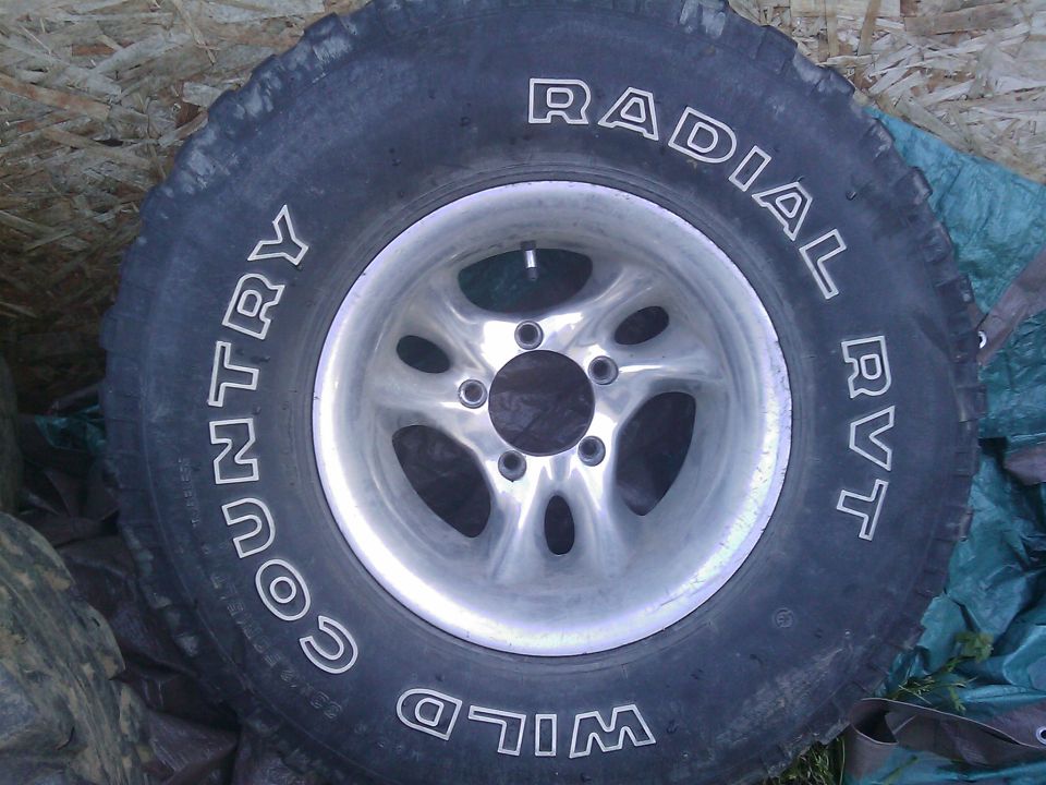 Goodyear Country-Wild Radial RVT tire on a 5-lug alloy wheel