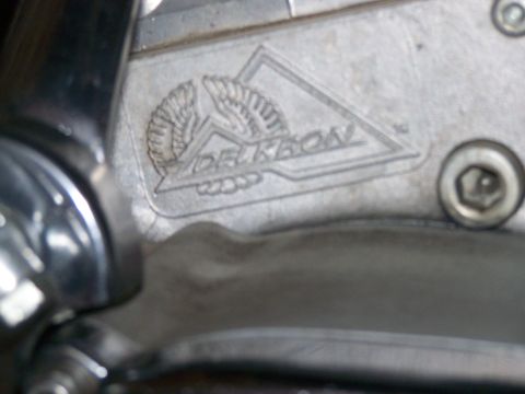 1988 Suzuki Samurai - Close-up of a metal engine part with the Delkron logo visible.