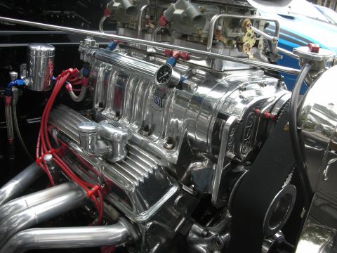 1998 Ford Crown Victoria - Close-up of a highly polished chrome engine a supercharger and dual carburetors.