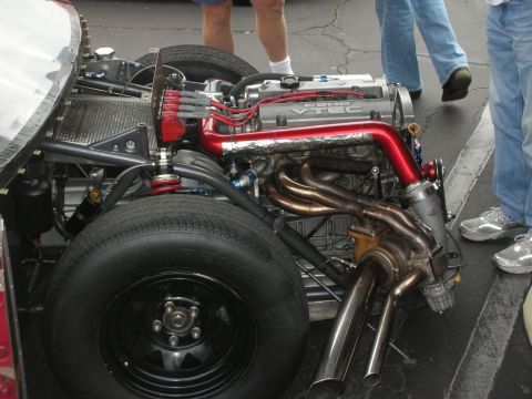 1998 Ford Crown Victoria - Close-up view of a modified engine bay, performance parts and custom fabrication.
