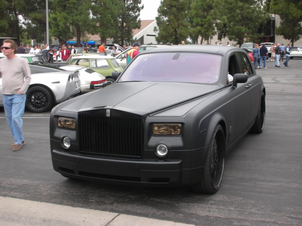 Matte black Rolls-Royce Phantom front 3/4 view