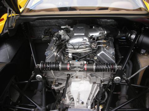 1998 Ford Crown Victoria - Close-up view of a powerful V8 engine, its intricate mechanical components and polished chrome details.