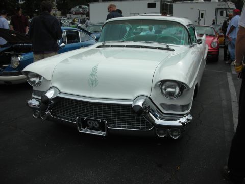 1998 Ford Crown Victoria - White 1955 Cadillac Eldorado with distinctive grille and chrome bumper details.