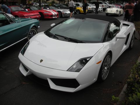 1998 Ford Crown Victoria - White Lamborghini Gallardo convertible at a car meet with other vehicles present.