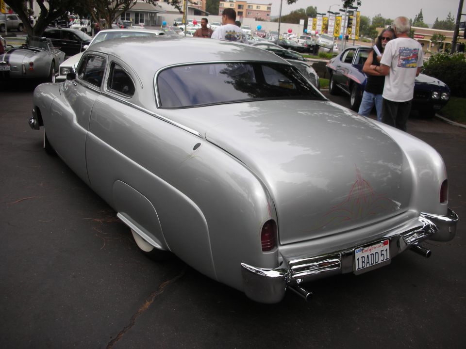 Silver custom coupe rear view with custom pinstriping and California license plate '1 BADD 51'