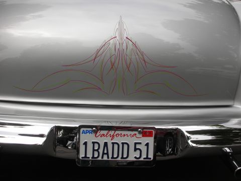 1998 Ford Crown Victoria - Custom pinstripes adorn the rear of this classic car, which has a California license plate.