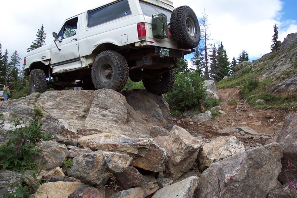 Keith climbing a sizable obstical like it is a curb