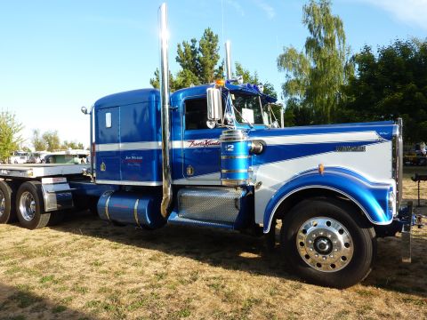 1981 Kenworth W900A - This 1981 Kenworth W900A features a distinctive blue and white paint scheme with chrome accents.